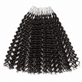 A bundle of deep wave hair extensions with black elastic ties, arranged in a fan shape against a plain white background.