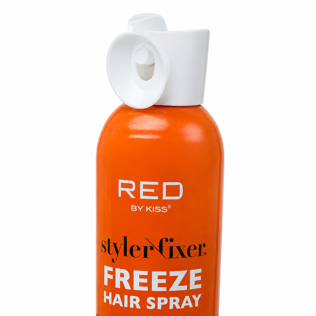 An orange aerosol can of Red By Kiss Styler Fixer Freeze Hair Spray with a white flip-top cap, shown against a plain white background.