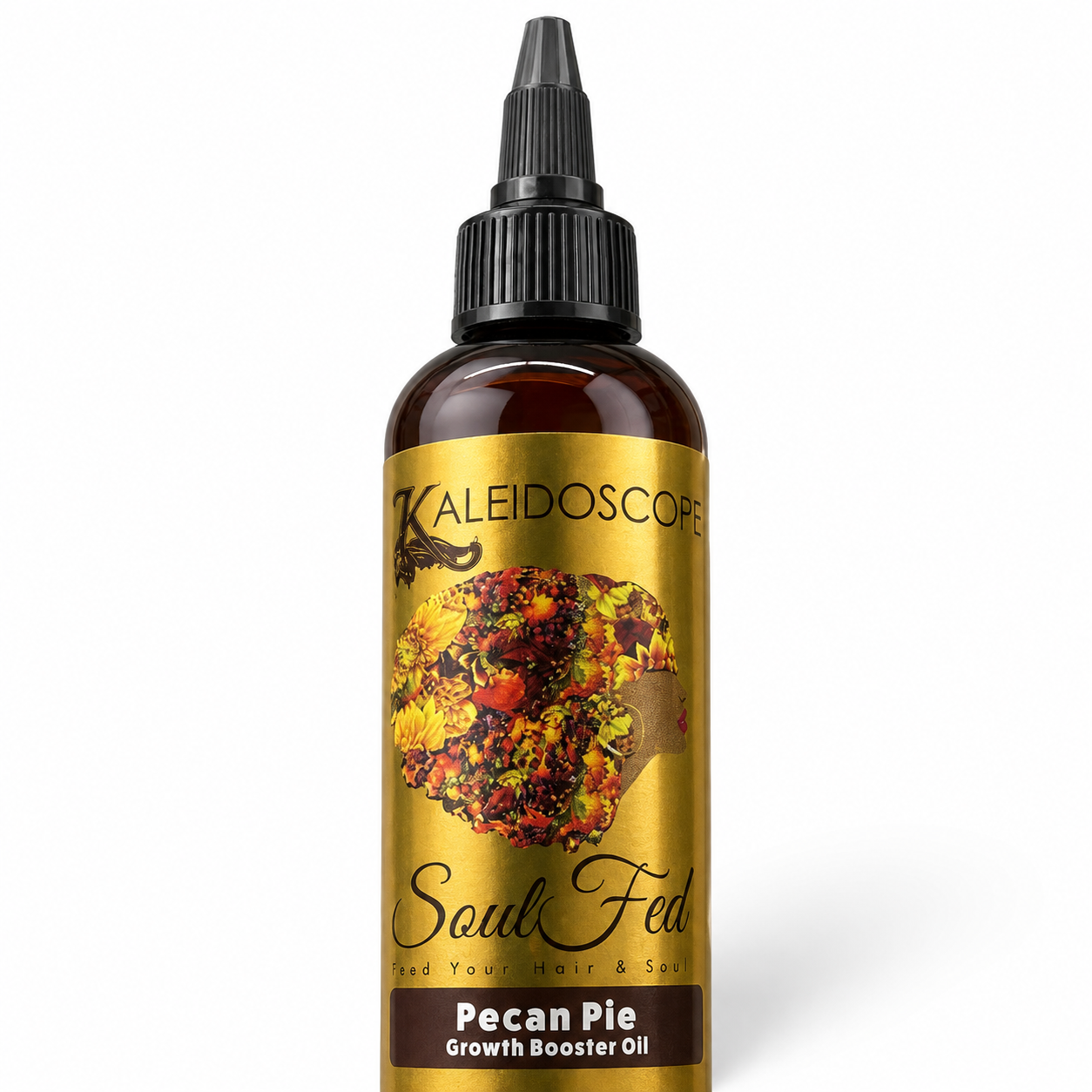 A bottle of Kaleidoscope Soul Fed Pecan Pie Growth Booster Oil, featuring a metallic gold label with a colorful floral design and a black dropper cap, set against a plain white background.