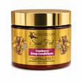 A jar of Kaleidoscope Soul Fed Cranberry Deep Conditioner with a metallic gold lid and a gold label featuring cranberry illustrations, on a white background.