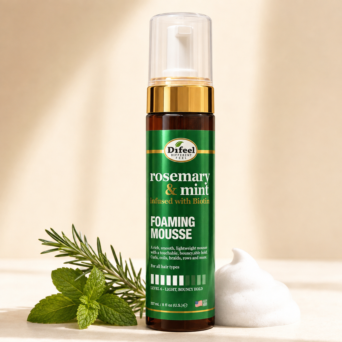 Difeel Rosemary and Mint Foaming Mousse beside fresh herbs and white styling foam