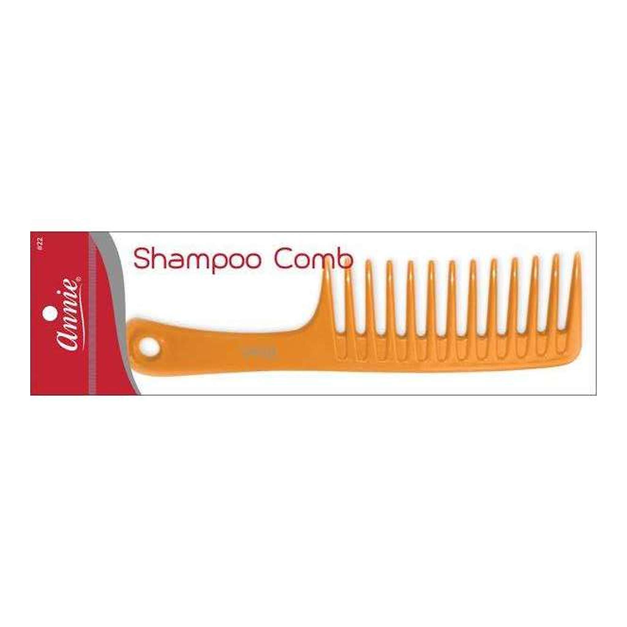 An orange plastic shampoo comb shown on its retail card packaging, which features a red and white header with the text 'Annie' and 'Shampoo Comb'.