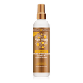Creme Nature Pure Honey Break Up Breakage Leave-In Conditioner in a white bottle with a metallic gold spray nozzle and a brown honey-themed label, shown on a white background.